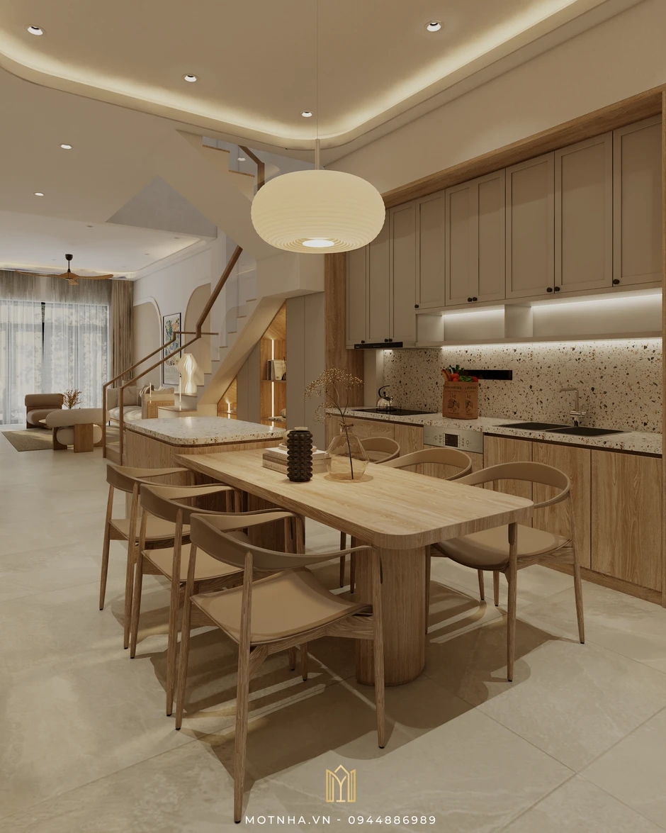 Dự án thiết kế nội thất nhà phố 2 tầng HLH tại TP Sơn La Khu bếp với hệ tủ bếp kịch trần, bàn đảo kết hợp bàn ăn tiện nghi, tạo nên sự liền mạch, tối ưu diện tích.