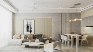 Phòng khách sử dụng bộ sofa chữ L phối da và nỉ, bàn trà đá trắng vân mây, đèn decor vàng đồng tạo điểm nhấn sang trọng.