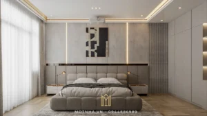 Giường bọc nỉ cao cấp, tab đầu giường đồng bộ, sử dụng đèn đọc sách ánh sáng vàng ấm.