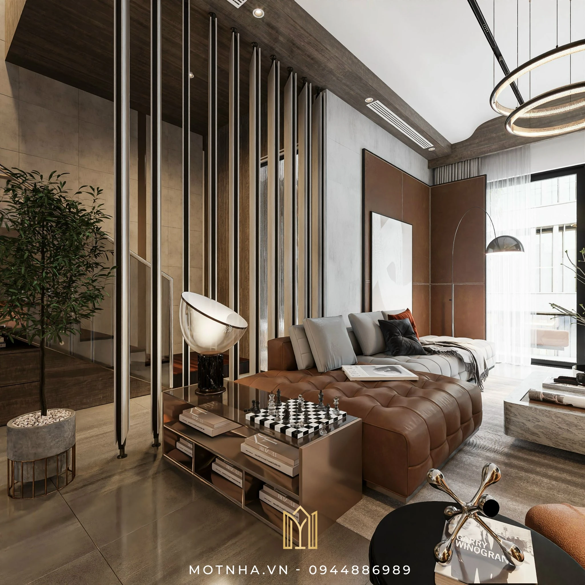 Dự án thiết kế và thi công hoàn thiện nhà phố 3 tầng TVH tại KĐT Vincom - TP Sơn La Không gian phòng khách tone nâu – xám kết hợp ánh sáng tự nhiên và đèn âm trần, tạo cảm giác ấm cúng mà vẫn sang trọng.