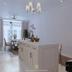 Bàn đảo bếp tích hợp hệ đèn led hắt dưới chân, mặt đá cao cấp, tạo điểm nhấn thẩm mỹ và công năng hoàn hảo.